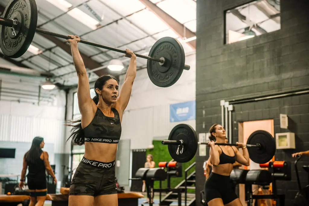 Barbell coaching during a private session
